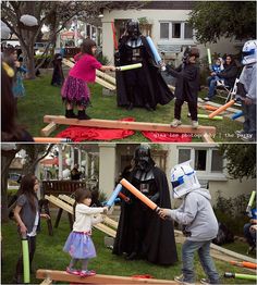 some people in costumes are playing with bats and darth vader is on the other side