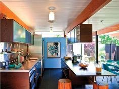 the kitchen is clean and ready to be used as a dining room or living room