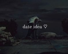 two people standing in the dark with text that reads date idea over them and an image of