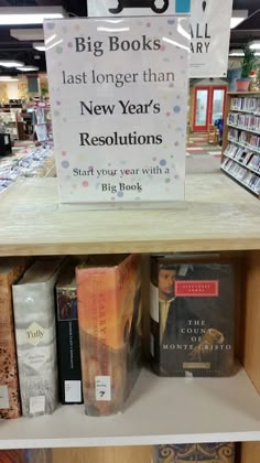 there is a sign that says big books last longer than new year's resolution