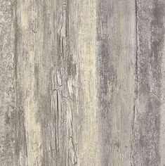 an old wooden wall with peeling paint and chipped paint on it's surface