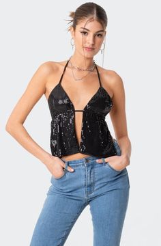 Sequin top Polyester, Spandex Halter-tie strap Open-back design Model wears size S Model height is 5'7 Item care: Hand wash Mini Vests, Streetwear 2023, Sequin Halter Top, Black Sequin Top, Backless Top, Swimwear Dress, Tie Top, Y2k Streetwear, Sequin Top