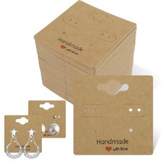 the package includes two pairs of earrings and a pair of earring clips with matching packaging