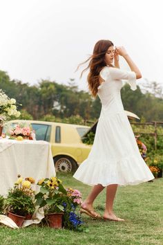 Cottagecore Ruffle Hem Dress For Brunch, Feminine Midi Dress With Ruffle Sleeves For Garden Party, Cottagecore Midi Dress For Garden Party, Cottagecore Midi Dress With Ruffles, White Midi Dress With Ruffle Hem For Garden Party, Cottagecore Lace Trim Dress For Brunch, Spring Midi Dress With Lace Cuffs, White Cottagecore Midi Dress For Brunch, White Midi