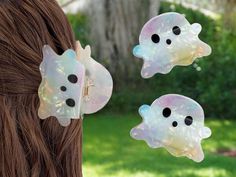 Get into the spooky spirit with this adorable Iridescent Ghost Hair Clip! This cute ghost-shaped clip is a must-have Halloween accessory, perfect for adding a playful touch to your hairstyle. Ideal for Halloween parties, trick-or-treating, or simply showing off your love for the holiday season! 👻 Height: 5.7 cm (2.2 inches) Width: 7.4 cm (2.91 inches) Ghost Hair, Claw Clip Hair, Halloween Hair Clips, Claw Hair Clip, Halloween Accessories Hair, Claw Hair Clips, Halloween Hair, Whimsical Fashion, Clip Hair