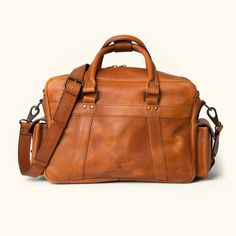 Roosevelt Buffalo Leather Pilot Bag | Amber Brown Buffalo Jackson, Dark Brown Leather Jacket, Amber Brown, Leather Camera Bag, Leather Jacket Style, Lambskin Leather Jacket, Leather Duffle Bag, Water Buffalo, Leather Travel Bag