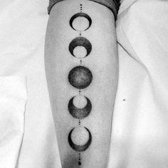 a man's leg with phases on it