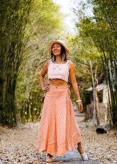 "Linen Skirt, Linen Wrap Skirt, Wrap Skirt, Long Linen Skirt, Maxi Orange Skirt, Summer Linen Skirt,  Sizing: Made in one size to fit XS to L / US: 0/2/4/6/8/10/12 Measurement: Wrap waist end to end 46'', maximum waist 39\" Hip max 45\" Length 36\" **Model is a size US 6 with 33\"bust 35\" hip. 165 cm tall.** Description: Made with 100% Linen fabric with subtle stripe pattern and raw texture. Medium thick, not see through. Very special rustic feel. Soft and comfortable. Lovely wrap skirt with ad Casual Asymmetrical Festival Skirt, Flowy Mini Wrap Skirt For Festival, Hippie Style Fitted Long Skirt, Hippie Fitted Long Skirt, Hippie Long Wrap Skirt For Spring, Summer Hippie Asymmetrical Maxi Skirt, Spring Hippie Long Wrap Skirt, Bohemian Asymmetrical Pleated Maxi Skirt, Bohemian Asymmetrical Gathered Skirt