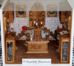 a doll house with furniture and accessories in it