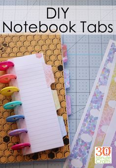 an open notebook with colorful markers on it and the title overlay reads diy notebook tabs