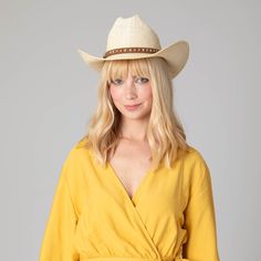 Exude luxury in the Wave Rider Women's Cattleman's Crease Cowboy hat. This exquisite hat is crafted from tightly woven 100% paper, featuring a distressed design and faux leather band. Its adjustable size and UPF 50+ sun protection make it the perfect accessory to protect from the elements in style. Absorb mid-day rays in effortless sophistication. Features: Color: NaturalMaterials: 100% PaperSize: 57cmBrim Size: 3.5"Sun Protection: UPF 50+Adjustable Rodeo Fedora With Woven Detail And Curved Brim, Rodeo Woven Fedora With Curved Brim, Woven Fedora With Curved Brim For Rodeo, Western Woven Hat Bands For Spring, Western Style Woven Hat Bands For Spring, Western Woven Fedora For Country Events, Woven Fedora With Short Brim For Country Events, Woven Fedora For Country Events, Fedora Straw Hat For Rodeo