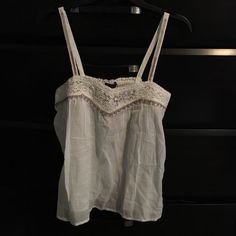 American Eagle Flowy Top. White Size Small But Fits More Like A Medium. New With Tags. Casual White Camisole For Daywear, White Bohemian Cotton Camisole, White Lace Trim Camisole Casual Style, White Lace Trim Casual Camisole, Casual Cream Camisole For The Beach, Thrift Finds Clothes, Sabrina Concert, Spaghetti Top, Personal Things