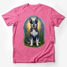 a pink t - shirt with a black and white dog sitting on the grass in front of a full moon