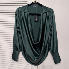 Satin Hunter Green Blouse With Plunging Neckline And Long Cuffs. Green Long Sleeve Blouse For Night Out, Elegant Green Blouse For Night Out, Chic Green Blouse For Night Out, Elegant Green Blouse For Date Night, Green V-neck Blouse For Date Night, Satin Blouse, Green Blouse, Hunter Green, Plunging Neckline