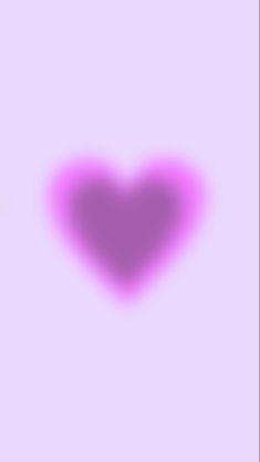 a heart shaped object is shown in the middle of a purple background with an overexposed shadow