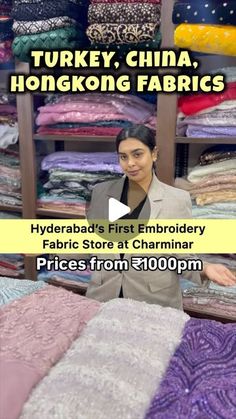 a woman standing in front of a pile of fabrics with the words turkey, china, hong