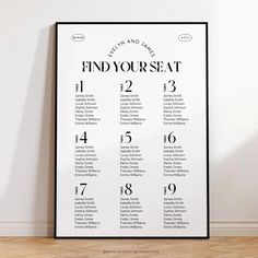 a black and white poster with the words find your seat on it in front of a wall