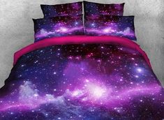 a bed with purple and blue stars on it