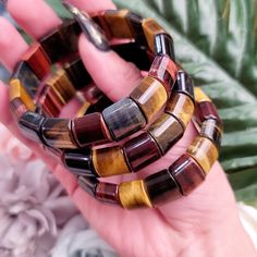 A beautiful Tiger Eye Stretchy Bangle Bracelet of your size selection. ~Red Tiger Eye Metaphysical Properties~ ♡ Chakra: Root ♡ Element: Earth ♡ Numerology: 4 ♡ Zodiac Sign: Capricorn, Leo, Sagittarius ♡ Brings focus and drive to accomplish goals ♡ Enhances intention setting & balances emotions ♡ Increases confidence, energy, passion, willpower & vitality ♡ Provides protection against negative energy ♡ Supports the blood and reproductive system Red Tiger Eye is the rare, red variety of Tiger Eye Multiple Bracelets, Bracelet Size Chart, Intention Setting, Body Energy, Endocrine System, Beads Pictures, Red Tigers Eye, Overcoming Fear, Line Patterns