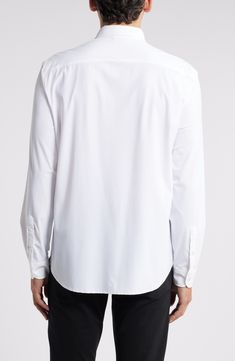 Soft, stretchy and all-day comfortable, this versatile white shirt smartly elevates any outfit and looks great whether you wear it tucked or untucked. 30 1/2" length; 44" chest (size Medium) Front button closure Spread collar Long sleeves with button cuffs 76% nylon, 24% elastane Dry clean Imported Formal White Top With Shirttail Hem, White Business Casual Shirt With Shirttail Hem, White Shirttail Hem Shirt For Business Casual, Nordstrom Store, Fabric Gifts, Free Fabric, Chest Size, Wear It, Emporio Armani