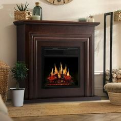 a living room with a clock and a fire place