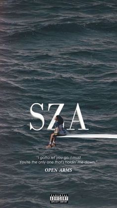 a man sitting on top of a boat in the ocean next to an advertisement for sza