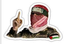 a man wearing a red and white bandana giving the peace sign with his hand