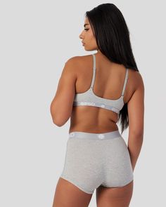 The Classic Bralette has the same breathable, ultralight, soft-to-the-feel as the signature Sports Bra but with a new feminine look. With fully adjustable straps and a bra clasp back, the Classic Bralette is made to fit just about any and every body. | PSD Women's Modal Solids Scoop Bralette in Grey, Size Large Everyday Bra With Padded Cups, Supportive Nursing Bra For Everyday Use, Padded Sports Bra In Solid Color, Gray Supportive Sports Bra, Athleisure Bra With Removable Pads, Everyday Full Coverage Sports Bra With Light Support, Functional Everyday Sports Bra With Adjustable Straps, Sporty Everyday Bra With Light Support, Everyday Light Support Sporty Bra