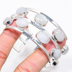 PRODUCT DESCRIPTION: Price: 1 Pieces Quality: AAA Fine Quality Handmade Jewelry Cuff Rainbow Fire Moonstone Moonstone Bangle Bracelet Women Jewelry White Moonstone Bangle Bracelet, White Moonstone Bangle, Adjustable White Gemstone Cuff Bracelet, White Gemstone Bangle For Gift, Adjustable White Round Cuff Bracelet, Silver Handmade Jewelry, Gift For Love, Rainbow Fire, Bracelet Women