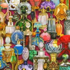 many different colored glass vases on display