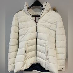 - Perfect Condition Never Worn Tommy Hilfiger Puffer In Size M. Tommy Hilfiger Winter Outerwear, Tommy Hilfiger White Long Sleeve Outerwear, Tommy Hilfiger Puffer Jacket, Tommy Hilfiger Jackets, Puffer Jacket, Iceland, Tommy Hilfiger, Puffer, Color White