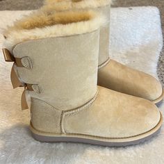 Brand New Ugg. Never Worn! Bailey Bow. Light Beige. Price Is Firm. Bow Light, Bailey Bow, Shoes Brand, Womens Uggs, Ugg Shoes, Light Beige, Beige Color, Women Shoes, Brand New