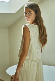 Our 'Carolina Knit Top' is the perfect addition to any wardrobe. Its sleeveless design and front button detail give it modern style, while the v-neckline flatters the silhouette. An ideal blend of fashion and function. Content & Care: 55% Acrylic, 45% Cotton Hand wash cold Sunglasses Necklace, Crop Top Sweater, Boho Bride, Midi Maxi Dress, Top Sales, Dress Romper, Button Detail, Bottoms Pants, Denim Dress