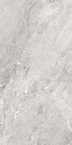 a white marble textured wall with grey veiners