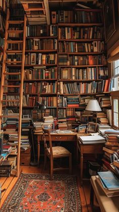 a room filled with lots of books on top of a wooden shelf next to a window