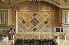 a stove top oven sitting inside of a kitchen next to wooden cupboards and cabinets