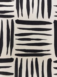 an abstract black and white pattern on fabric