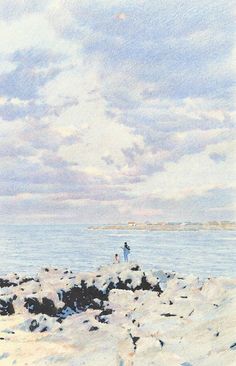 two people standing on rocks near the ocean under a blue sky with white fluffy clouds