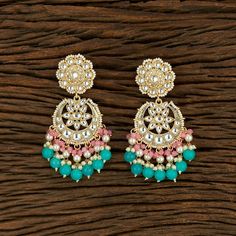 Gorgeous Pastels Jhumkas with pearl. Each piece is handcrafted . All the raw material used in this product is of high quality and is handcrafted with love. Height = 90 mm || Width = 52 mm Trendy Design Indo Western Earring 100% Satisfaction Guarantee: Long Lasting Plating, High-Quality Stones. Gifting: This pair of earrings come in a beautiful gift pack , making it an ideal gift for birthday, wedding anniversary or wedding gift. Occasion: Perfect choice for any Indian occasion. Care: It is advis Multicolor Chandbali Earrings With Dangling Beads, Pink Meenakari Fusion Danglers, Fusion Style Pink Meenakari Danglers, Pink Fusion Style Chandbalis For Celebration, Multicolor Chandbali Chandelier Earrings For Pierced Ears, Pink Meenakari Earrings In Fusion Style, Multicolor Meenakari Drop Earrings, Pink Meenakari Fusion Earrings, Traditional Pink Chandelier Earrings For Gift