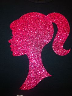 the silhouette of a woman's head is made out of pink glitter