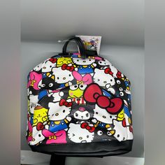 Licensed Sanrio Backpack. Vegan Leather! 10" Mini Backpack With Hello Kitty And Friend Characters! Super Spacious And Very Secure, Zippers Work Perfectly! No Flaws, Little Pocket May Fit Multiple Items! Straps Are Adjustable!! Hello Kitty Travel Backpack, Trendy Hello Kitty Print Bag For Back To School, Trendy Hello Kitty Print Back To School Bag, Hello Kitty Print Backpack For Daily Use, Hello Kitty Travel Backpack Standard Shape, Hello Kitty Print Backpack, Hello Kitty Travel Bag For Back To School, Trendy Hello Kitty Back To School Bag, Hello Kitty Backpack For Daily Use