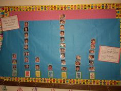 a bulletin board with pictures and handprints on it