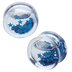 pair of blue stars and moon acrylic plugs in clear glass with silver tips