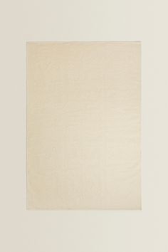 an empty white square on a beige background