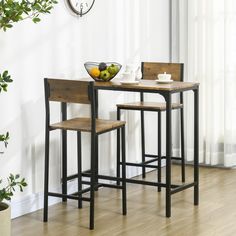 This 3-piece Counter set from HOMCOM offers you a great place to entertain your friends or family for a dinner or wine night in the comfort of your own indoor or outdoor space. This table set features a wide bar table and 2 matching high-back stools that tuck neatly underneath the table when not in use. Stylish and practical, this dining bar set a great addition to enhance your current home decor! Bar Table Set, Small Kitchen Tables, Bar Table And Stools, Industrial Dining Table, Bar Table Sets, Industrial Dining, Square Bar, Table Haute, Kitchen Table Settings