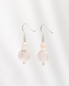 Elevate your style with the enchanting allure of our Freshwater Pearl Duo Earrings, meticulously handcrafted from sterling silver. Designed for those who appreciate elegance and versatility, these earrings epitomize timeless beauty. Each pair features genuine freshwater pearls, renowned for their lustrous charm and symbolism of purity. Features: Genuine Freshwater Pearls: Embrace the luxurious beauty of freshwater pearls, celebrated for their exquisite luster and natural elegance. Each earring s Freshwater Pearl Earrings, Freshwater Pearls Earrings, Necklace Box, Unique Boutique, Earring Gifts, Crystal Earrings, Fashion Earrings, Timeless Beauty, Fresh Water