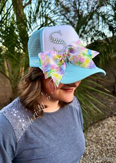 What an adorable addition to an outfit! Get this hat with any initial you like :) These TWO STYLES of trucker hats are both customized with a glittery, rhinestoned initial, and then have been adorned with a cute, and colorful tie dye bow which has also been finished with 3 rhinestones on the corner for the perfect finishing touch. Each hat is adjustable on the backside with a pop/snap closure. Pink/Purple Hat Blue Hat and a Solid White Hat are all available Hat With Bow, Purple Hat, Monogram Hats, Custom Trucker Hats, Painted Hats, Rose Violette, Purple Hats, Diy Hat, Hat Ideas