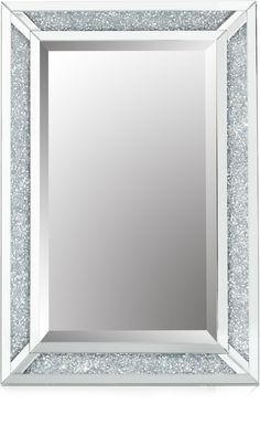 a square mirror with silver glitters on the edges and an empty frame in the middle