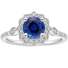 a blue sapphire and diamond ring in white gold