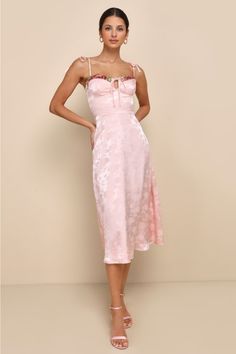 Make your day extra whimsical by slipping into the Lulus Ethereal Muse Light Pink Satin Jacquard Embroidered Midi Dress! Sleek woven satin jacquard boasts a sweet floral pattern as it falls from tying straps into a sweetheart neckline that features colorful floral embroidered trim and a sweet tying keyhole detail. The bustier-inspired bodice and high, fitted waist sit atop a classic A-line skirt that finishes at a chic midi hem. Hidden back zipper/clasp. Fit: This garment fits true to size. Length: Mid-calf length. Size medium measures 41.5" from adjustable straps to hem. Bust: Great for any cup size. Waist: Fitted - very fitted at natural waist. Hip: Not Fitted - fuller skirt allows room for hips. Undergarments: May be worn with a strapless bra, adhesive bra, petals, or no bra. Fabric: Fa Midi Dress Satin, Floral Slip Dress, Lulu Fashion, Embroidered Midi Dress, Embroidered Trim, Adhesive Bra, Dress Satin, Sweet Floral, Strapless Bra